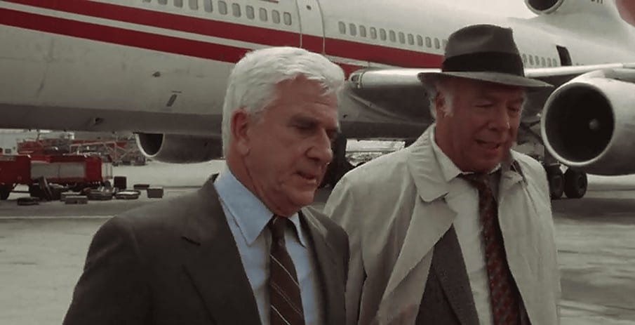 Pensa come Una pallottola spuntata! — Sei all’aeroporto e cerchi un criminale. Cosa fai?