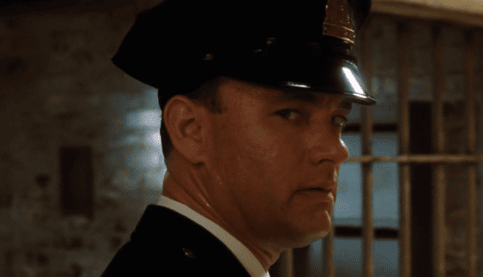 Milagros inesperados — ¿Qué hace John Coffey con la enfermedad del protagonista?